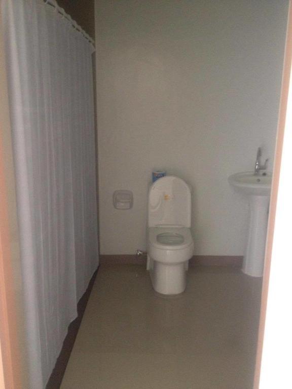 Rullan Apartelle Anda  Екстер'єр фото