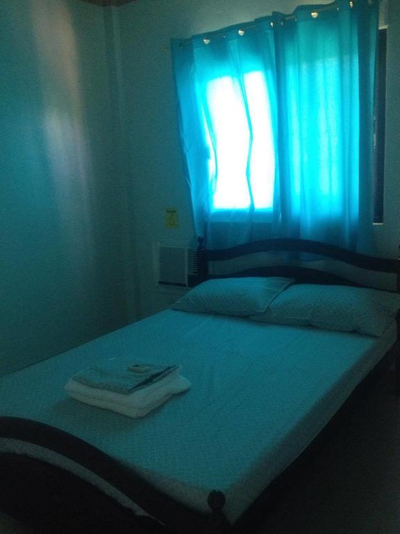 Rullan Apartelle Anda  Екстер'єр фото