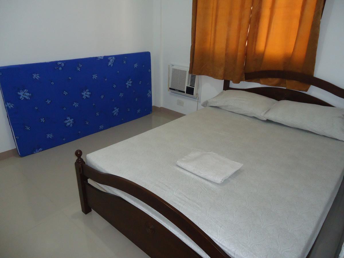 Rullan Apartelle Anda  Екстер'єр фото
