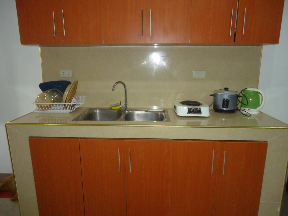 Rullan Apartelle Anda  Екстер'єр фото