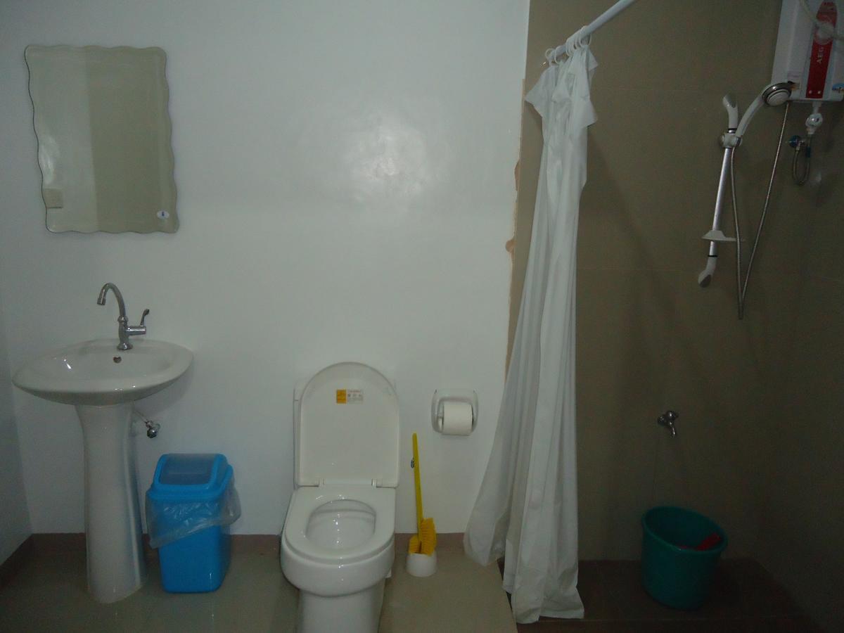 Rullan Apartelle Anda  Екстер'єр фото